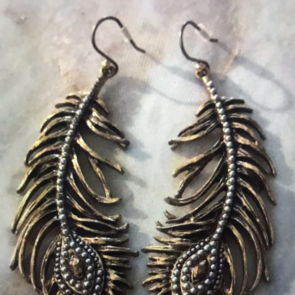 Metal gold tone feather earrings